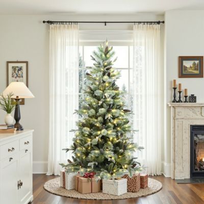 Image showing  6.5 ft. Pre-Lit Artificial Pine Christmas Tree with Frosted Green Branches with Stand