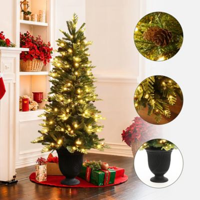 Image showing  4.5 ft. Pre-Lit Artificial Pine Christmas Tree with Pinecones and Black Urn Planter Pot