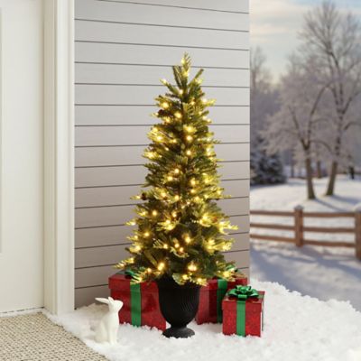 Image showing  4.5 ft. Pre-Lit Artificial Pine Christmas Tree with Pinecones and Black Urn Planter Pot