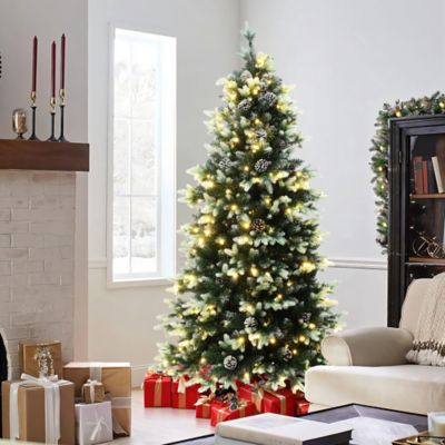 Image showing  6 ft. Pre-Lit Green Branches with Green and White Tips Artificial Christmas Tree with Stand