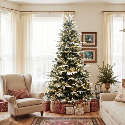 Image showing  7.5 ft. Pre-Lit Lightly Flocked Artificial Christmas Tree with Pinecones and Metal Stand