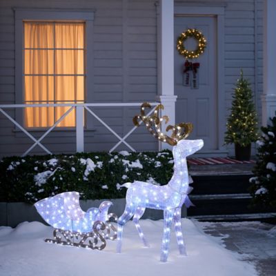 Image showing  2-Piece White Reindeer and Sleigh with Silver Bow and Ornaments Outdoor Holiday Decoration with Lights