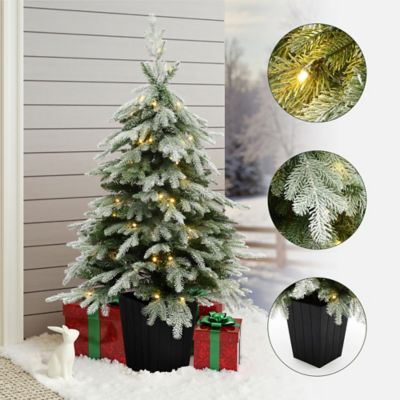 Image showing  4.4 ft. Pre-Lit Green Branches Lightly Flocked Artificial Christmas Tree Potted