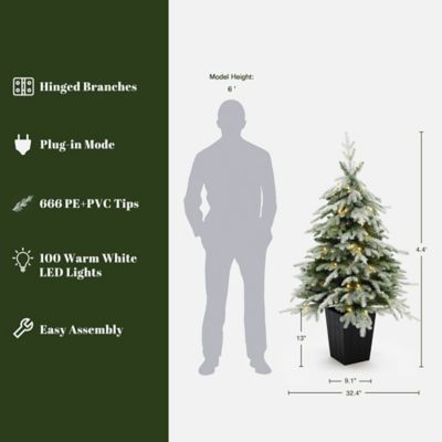 Image showing  4.4 ft. Pre-Lit Green Branches Lightly Flocked Artificial Christmas Tree Potted