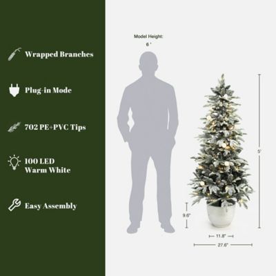 Image showing  5 ft. Flocked Artificial Tree Potted and Pre-Lit with 100 Lights