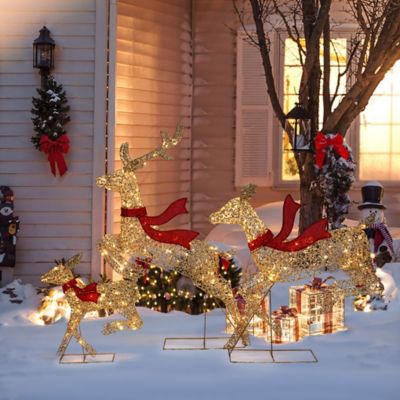 Image showing 1 th LuxenHome 3-Piece Champagne Gold PET Running Deer Family Outdoor Holiday Decoration with Lights
