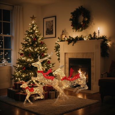 Image showing 4 th LuxenHome 3-Piece Champagne Gold PET Running Deer Family Outdoor Holiday Decoration with Lights