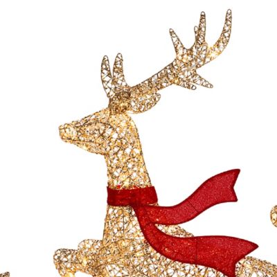 Image showing 7 th LuxenHome 3-Piece Champagne Gold PET Running Deer Family Outdoor Holiday Decoration with Lights