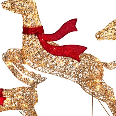 Image showing 9 th LuxenHome 3-Piece Champagne Gold PET Running Deer Family Outdoor Holiday Decoration with Lights