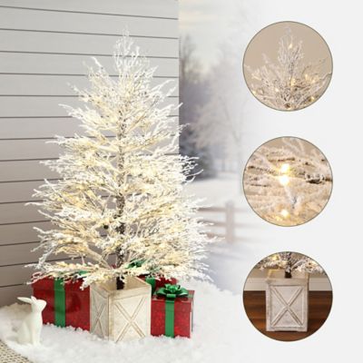 Image showing  5 ft. Pre-Lit Snowy Artificial Christmas Tree with Warm White Lights in Rustic MgO Crate