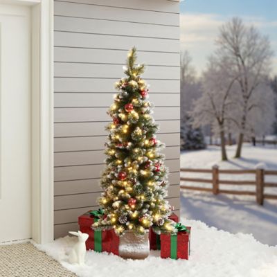 Image showing  5 ft. Pre-Lit Artificial Pine Christmas Tree with Pinecones and Snowflake Planter Pot