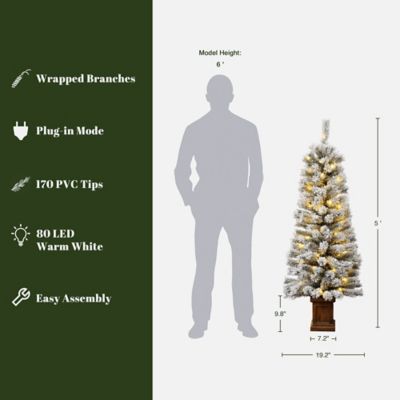 Image showing  Artificial 5 ft. Pre-Lit Flocked Fir Christmas Tree in Square Planter, Indoor Holiday Accent