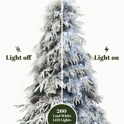 Image showing  6 ft. Pre-Lit Full Snowy Branches Artificial Pine Christmas Tree with Pinecones and Stand