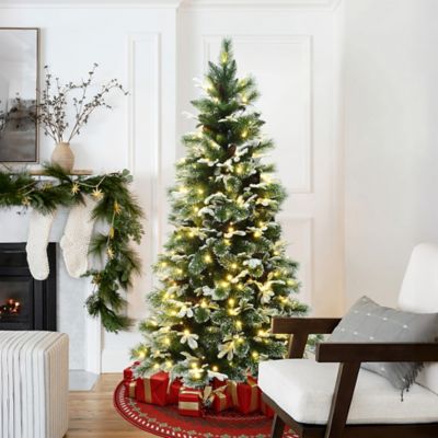 Image showing  6 ft. Pre-Lit Snow-Flocked Green Branches Artificial Pine Christmas Tree with Metal Stand