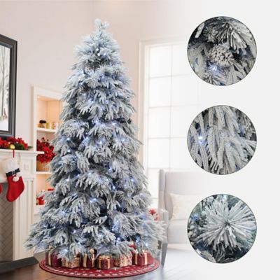 Image showing  7 ft. Pre-Lit Full Snowy Branches Artificial Pine Christmas Tree with Pinecones and Stand
