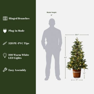 Image showing  4 ft. Pre-Lit Green Artificial Christmas Tree with Round Wood Pot