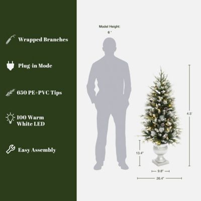 Image showing  4.5 ft. Pre-Lit Green Artificial Christmas Tree with Light Faux Snow and White Pot