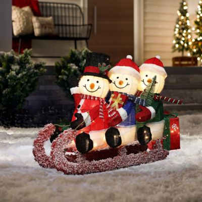 Image showing  Lighted Snowman Family on Sled in Winter Coats, Outdoor Christmas Yard Decoration
