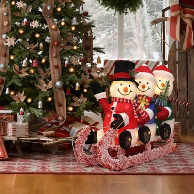 Image showing  Lighted Snowman Family on Sled in Winter Coats, Outdoor Christmas Yard Decoration