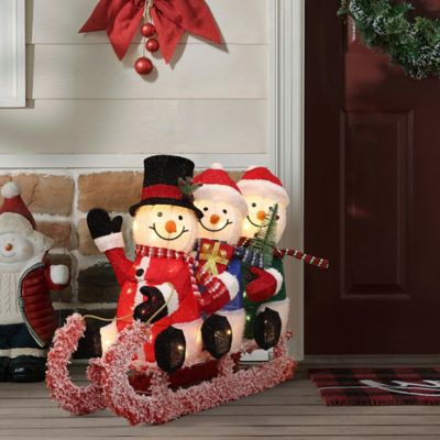Image showing  Lighted Snowman Family on Sled in Winter Coats, Outdoor Christmas Yard Decoration