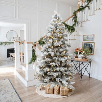 Image showing  7.5 ft. Snow-Flocked Cedar Christmas Tree Pre-Lit with Teardrop LED Lights & Hinged Branches