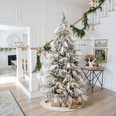 Image showing  6.5 ft. Pre-Lit Flocked Sweeping Branches Artificial Christmas Tree with Metal Stand