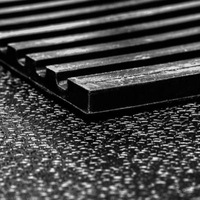 Image showing  48 in. x 72 in. Heavy-Duty Black Rubber Utility Mat - 0.75 in. Thick, Slip-Resistant for Stalls, Trailers, Gyms & More