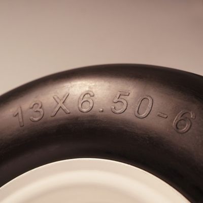 Image showing  13 x 6.50-6 Flat Free Zero-Turn Lawn Mower Smooth Tread Tire Assembly with Universal Kit, 3/4 in. Bushings