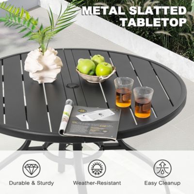 Image showing  5 pc. Outdoor Dining Set with Textilene Chairs and Round Table with Umbrella Hole
