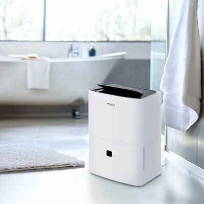 Image showing 10 th Whirlpool 50 Pint Dehumidifier for 3,000 sq. ft. with Caster Wheels & Carry Handles in White