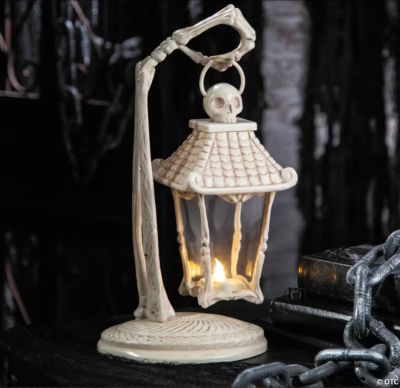 Seasons 16 1/2in. Light-Up Skeleton Crew Bone Lantern Halloween Tabletop Decoration