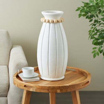 Harper & Willow Magnesium Oxide Decorative Vase with Light Brown Beads and Carved Grooves