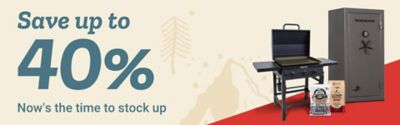 Promotional banner with a light beige background and subtle pine tree and abstract graphics. Large teal text reads: Save up to 40 percent. Smaller teal text below reads: Now’s the time to stock up. On the right side of the banner are product images including a black gas grill with side shelves, a Winchester gun safe, a bag of Pit Boss Competition Blend wood pellets, and a bag of lump charcoal. A red angled accent appears along the bottom edge of the banner.