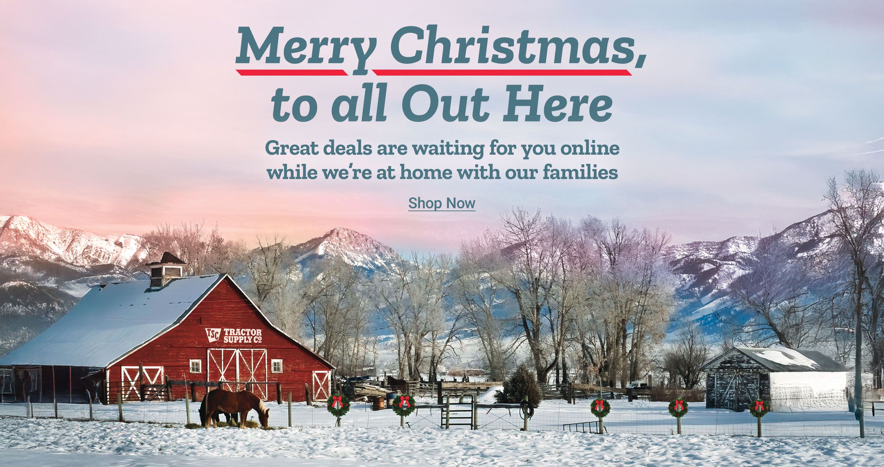 Promotional holiday image featuring a snowy rural farm scene at sunrise or sunset. Text at the top reads: Merry Christmas, to all Out Here. Below that, text reads: Great deals are waiting for you online while we're at home with our families. A call to action below reads: Shop Now. The background shows a red Tractor Supply Co. barn with white trim, a fenced pasture with a horse grazing in the snow, holiday wreaths on fence posts, leafless trees, and snow-covered mountains in the distance under a soft pastel sky.