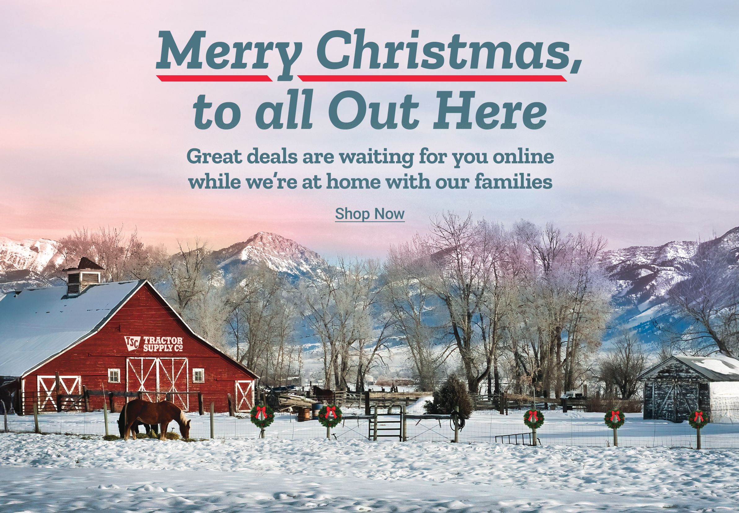 Promotional holiday image featuring a snowy rural farm scene at sunrise or sunset. Text at the top reads: Merry Christmas, to all Out Here. Below that, text reads: Great deals are waiting for you online while we're at home with our families. A call to action below reads: Shop Now. The background shows a red Tractor Supply Co. barn with white trim, a fenced pasture with a horse grazing in the snow, holiday wreaths on fence posts, leafless trees, and snow-covered mountains in the distance under a soft pastel sky.