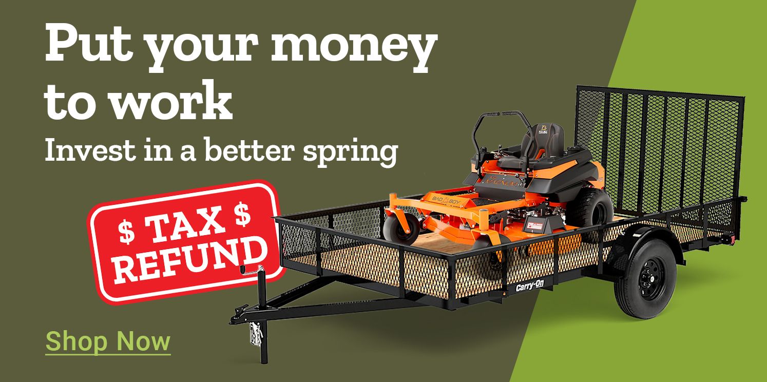 Put your money to work. Shop Now. A promotional banner featuring an orange Bad Boy zero turn lawn mower positioned on a black Carry-On utility trailer against a green background.