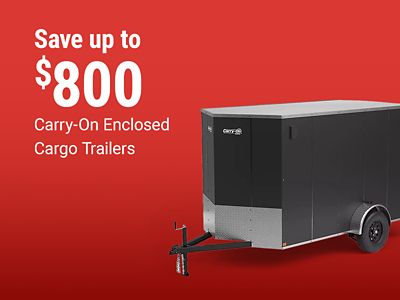 Tractor Supply Company promotion. Save up to 800 dollars on Carry-On enclosed cargo trailers. Image shows a black enclosed cargo trailer on a red background.