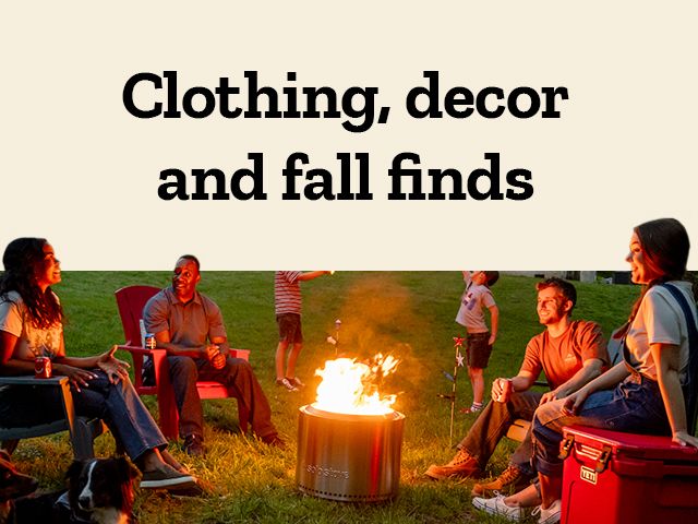 A diverse group of friends relax around a glowing fire pit on a cool evening,enjoying the warmth and each other’s company in a backyard setting. Under the heading "Clothing,decor and fall finds",this cozy scene showcases seasonal outdoor apparel,festive decor,and autumn-ready essentials perfect for backyard gatherings and cool-weather style.