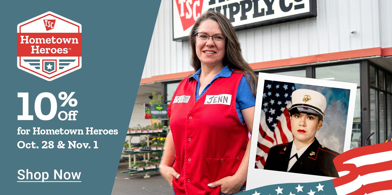 Tractor Supply Co. Hometown Heroes promotion offering 10% off for verified heroes on Saturday, November 1. Image features a female TSC team member named Jenn standing outside the store, with an inset photo of her in military uniform in front of an American flag. Banner includes the TSC Hometown Heroes badge and 'Shop Now' call to action.