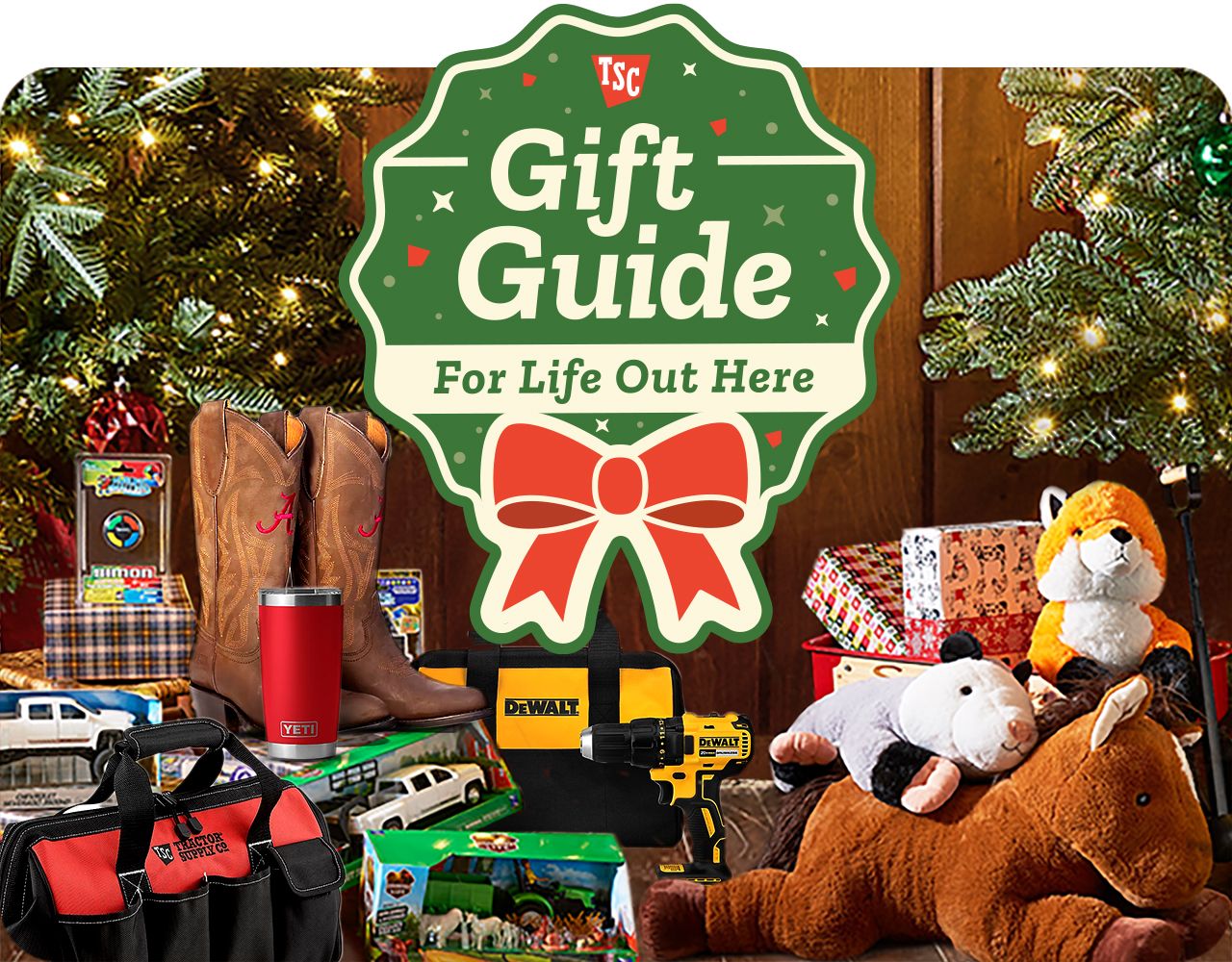 Holiday-themed promotional banner titled Gift Guide For Life Out Here featuring a green badge design with a red ribbon bow at the center. The background shows Christmas gifts under a decorated tree, including plush animals, toy trucks, and boxed toys. The warm lighting and rustic wooden floor create a cozy festive atmosphere highlighting holiday shopping ideas.